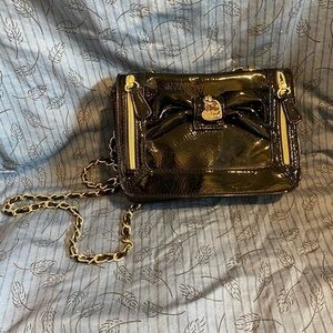 Betsey Johnson faux patent crossbody with gold toned accents